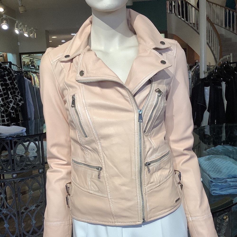 Fabulous lamb leather  in soft ecru peach.  Bit distressed. Tons of detail ,fun